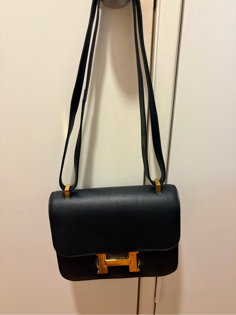Elegant Black Crossbody Bag with Gold Accent